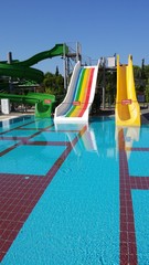 Colorful, closed water slides and pool
