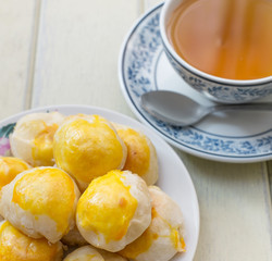 Chinese Cake and hot tea, selective focus point