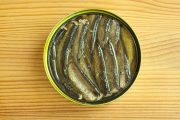 sprats on a wooden table