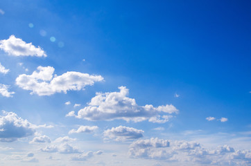 blue sky background with tiny clouds