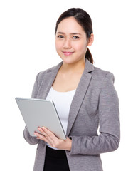 Businesswoman use of the tablet