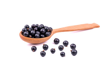 Black currants in spoon