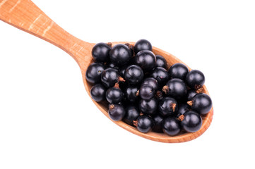 Black currants in spoon
