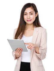 Asian businesswoman use of the tablet pc
