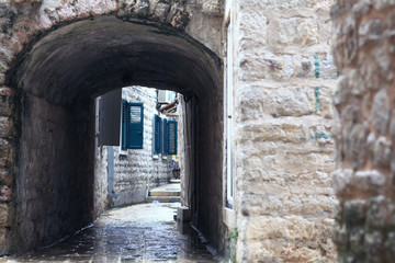 Fototapeta premium paved street stone walls Europe