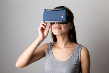 Young Woman watching via the VR device