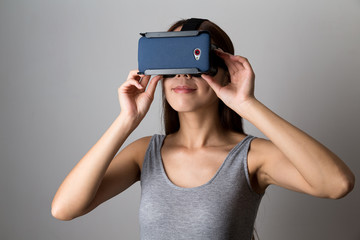 Young Woman using the virtual reality equipment