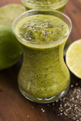 Healthy green fresh fruit and vegetable juice smoothie with chia
