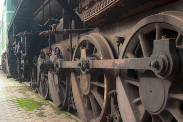 Fototapeta na wymiar The wheels of a steam locomotive