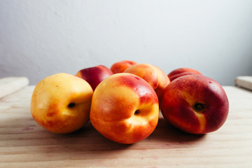 juice nectarines on wood table top view