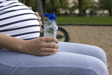 Pregnant woman drinking water