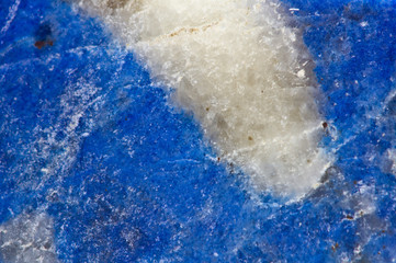 Stone structure. Lazurite mineral. Macro.