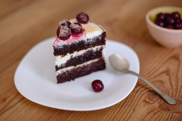 Homemade chocolate pie on vintage wooden background