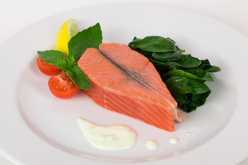 salmon steak with basil and spinach 