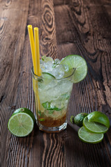 Mojito coctail on wood background.