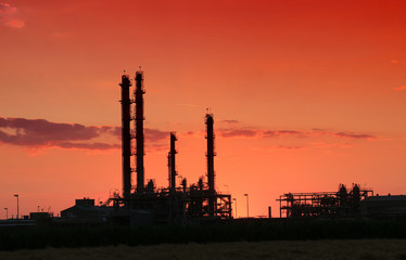 Fototapeta na wymiar Petrochemical refineries in the sunset