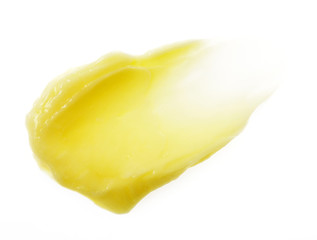 Yellow color skincare balm on background - obrazy, fototapety, plakaty