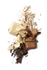 Beige and brown eye shadow cracked on background