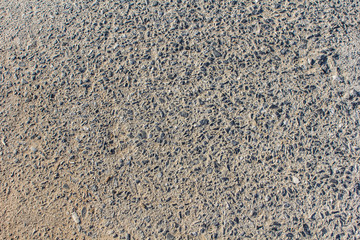 floor paving consisting of small pebbles embedded in cement