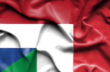 Waving flag of Italy and Netherlands