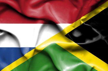 Waving flag of Jamaica and Netherlands