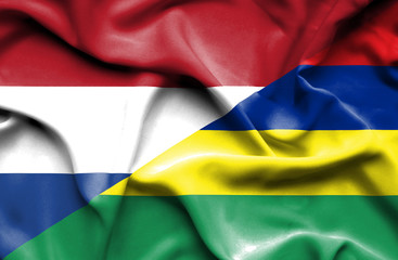 Obraz premium Waving flag of Mauritius and Netherlands