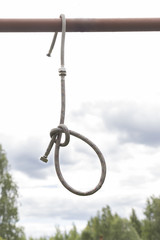 Fototapeta premium Make a loop of the hose against the sky