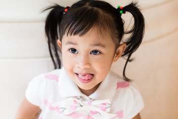 Adorable girl with funny face expression