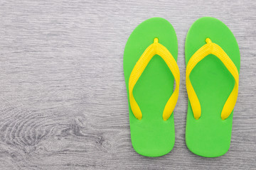 Flip flop on wooden background