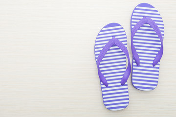 Flip flop on wooden background