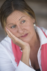 Portrait sad lonely mature woman