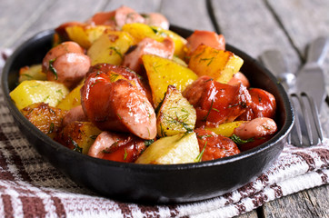 Potatoes with sausages