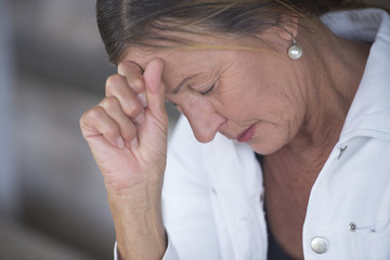 Fototapeta premium Sad depressed mature woman portrait