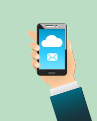 Cloud computing concept with mobile app and message symbol. Hand holding smartphone.