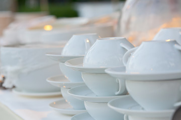 Cup of soup being prepared for the wedding dinner.