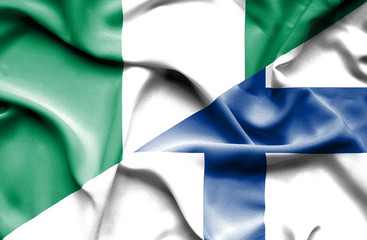 Waving flag of Finland and Nigeria