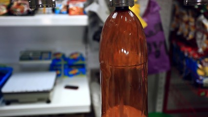 Beer store. process of Draft beer is poured into the bottle