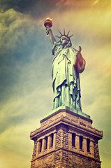 Naklejka premium Close up of the statue of liberty with its pedestal, New York City, vintage process