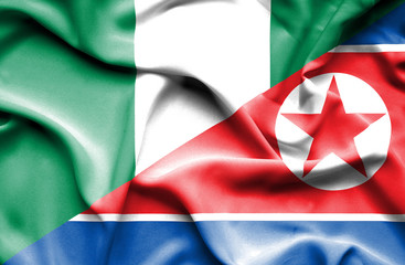 Waving flag of North Korea and Nigeria