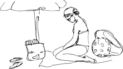  girl in a bikini on the beach sunbathing