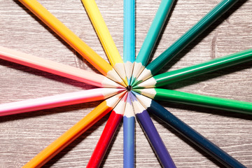 Naklejka premium Colorful Pencils On Wooden Background