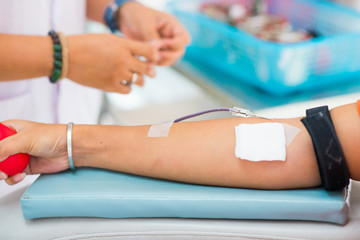 donating blood in a hospital room