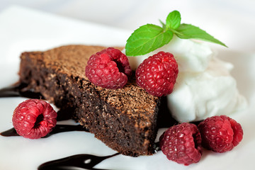 Chocolate dessert with raspberry and mint