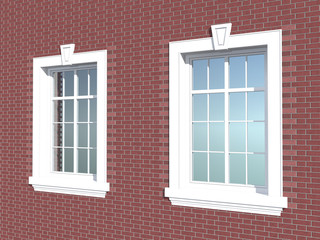 Two windows in a brick wall