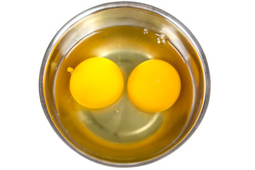 Raw eggs in bowl