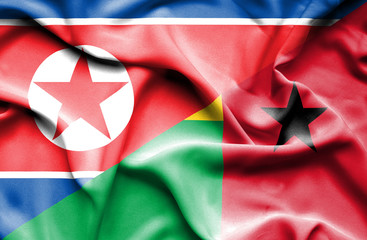 Waving flag of Guinea Bissau and North Korea