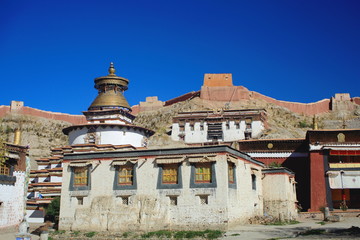 Kumbum-Tashigomang pagoda jutting over Tsuklakhang temple. Pelkhor Chode-Gyantse-Tibet. 1647