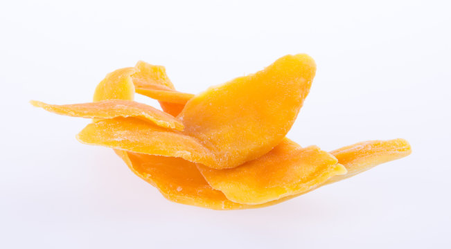 mango dry or dried mango slices on background.