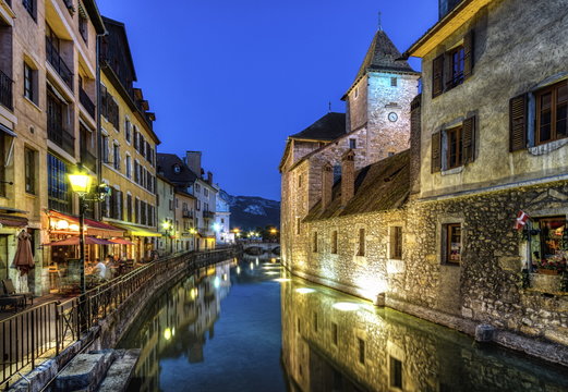 Palais de l'Ile jail and canal in Annecy old city, France, HDR
