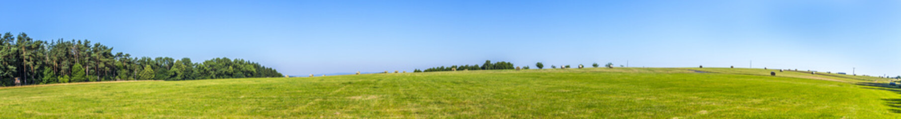 rural landscape with fields and blue sky © travelview